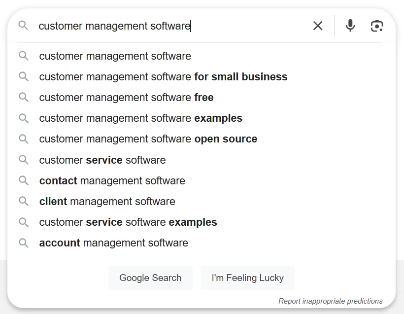 Search suggestions for customer management software on a search engine.