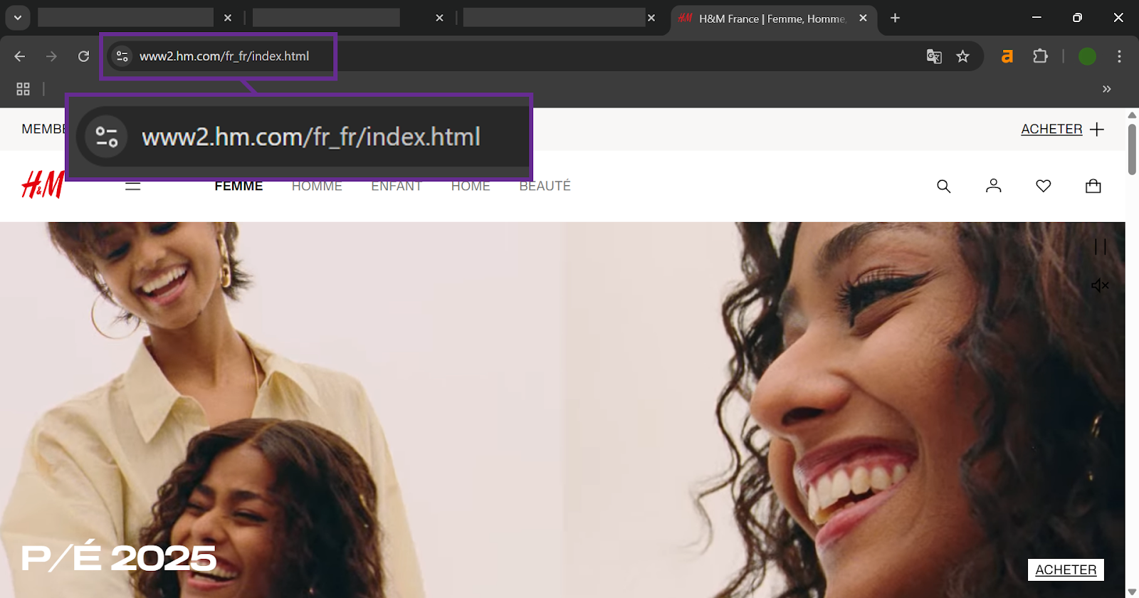 Two smiling women enjoying each other's company in a light background.